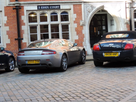Aston Martin and a Bentley… casual.